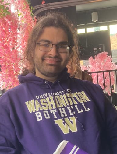 A picture of me in a University of Washington Bothell purple sweatshirt
